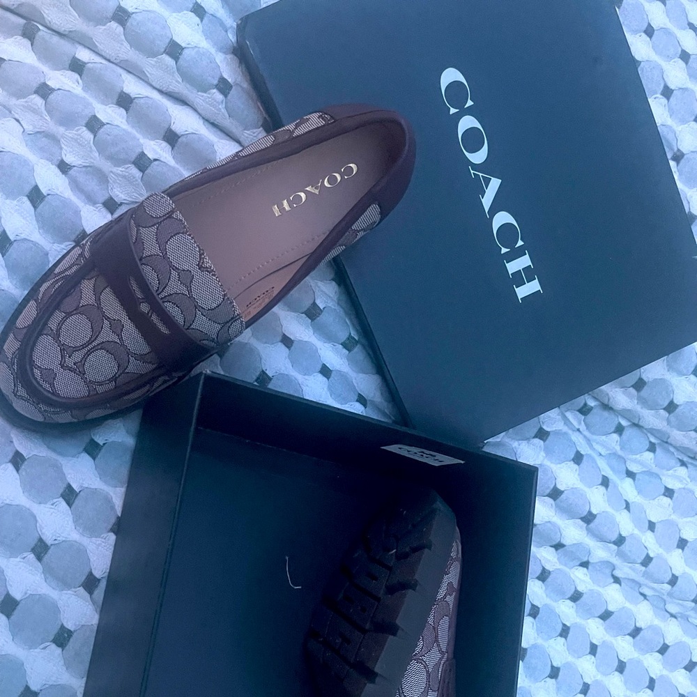Brand New Coach Loafers women’s Never worn and original box.